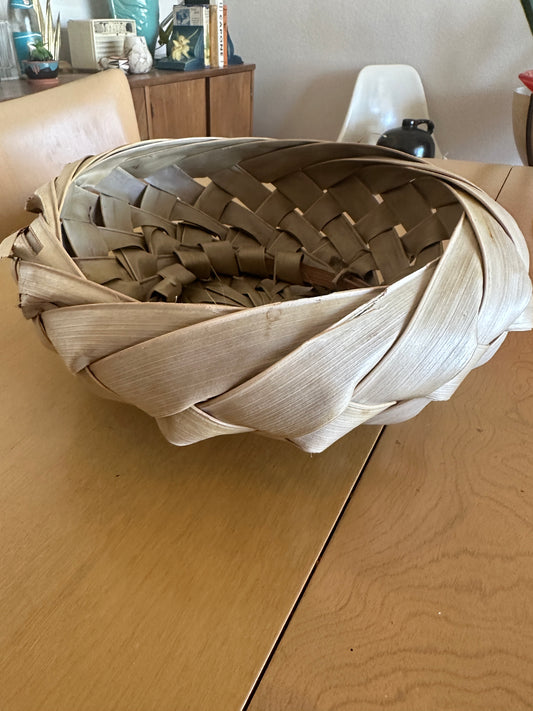 Hand woven palm leaf basket